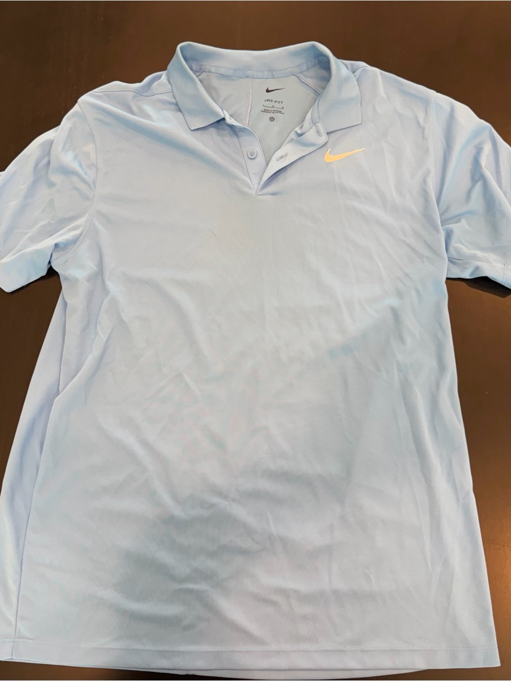 Nike Light Blue Polo with Yellow Swoosh